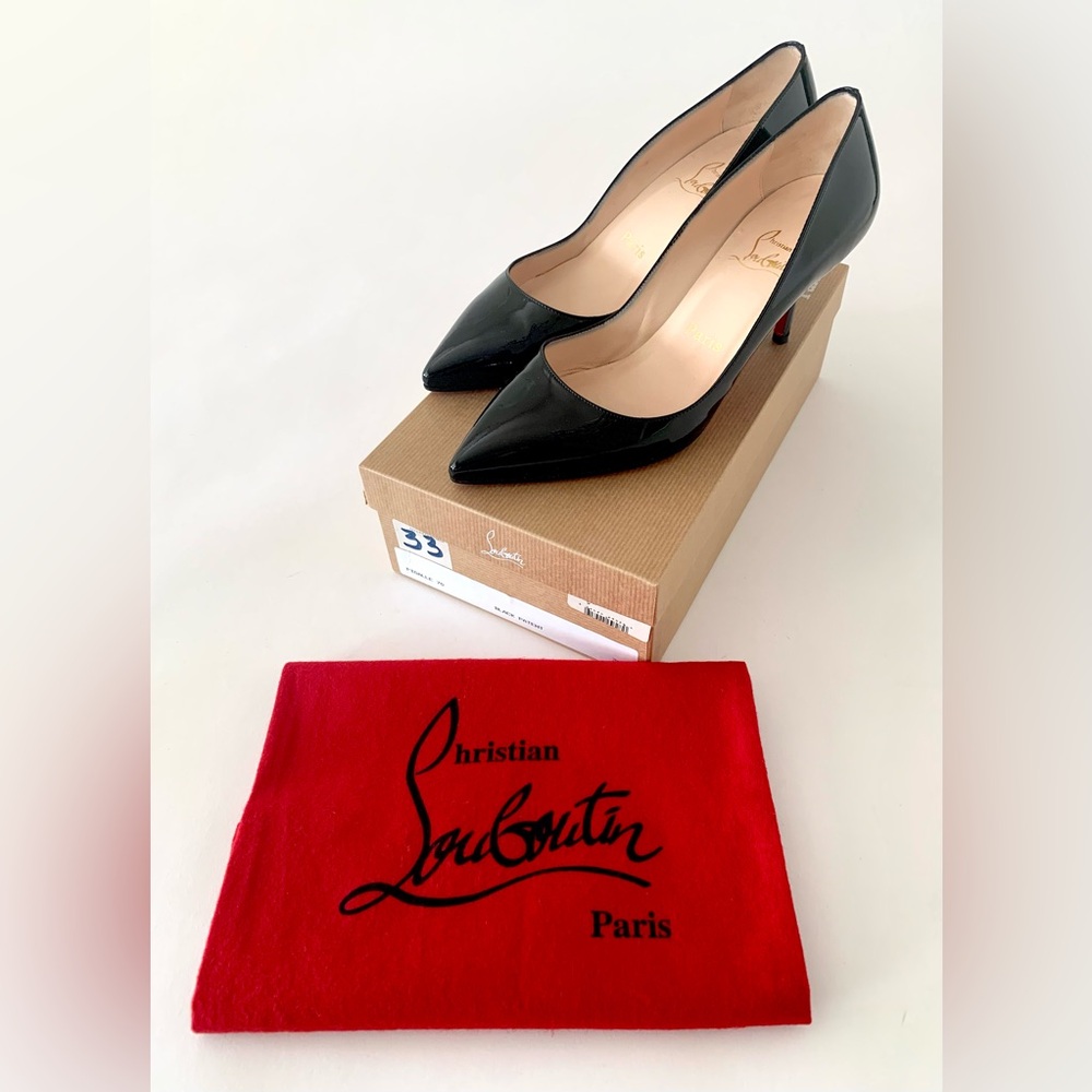 Christian Louboutin Pigalle 70 in black patent leather.
